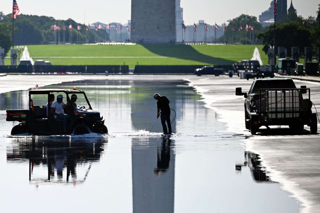 Refilling starts for newly painted Reflecting Pool in Washington, in photos