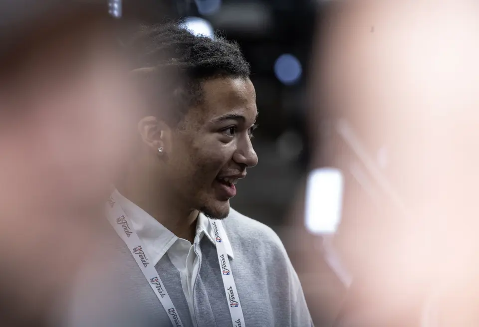 Former San Antonio high school player Kingston Fleming, who’s entering the draft this year, talks with other attendees prior to the start of Game 2 of the NBA Championship at Frost Bank Center in San Antonio on Friday, June 5, 2026.