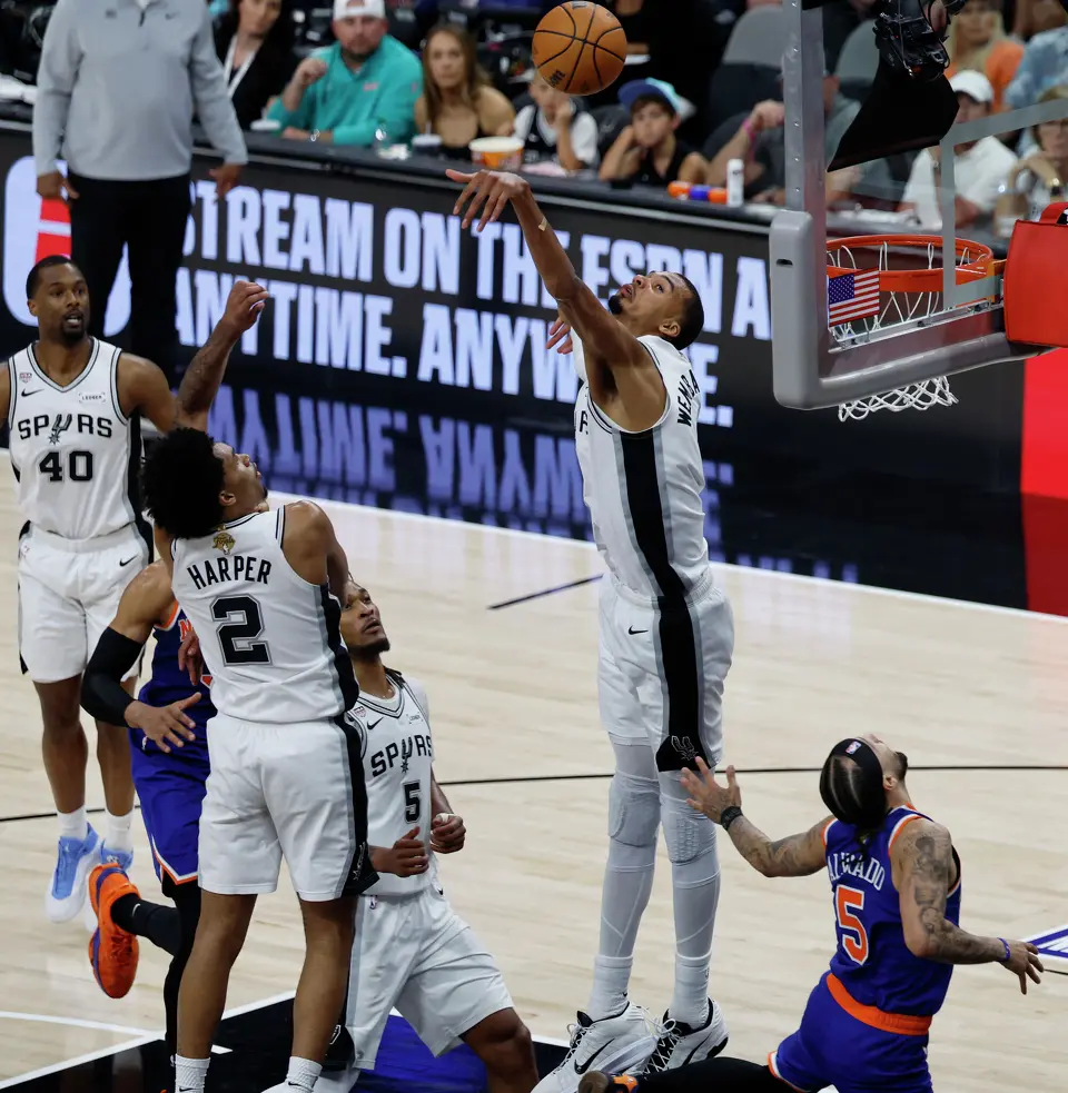 San Antonio Spurs center Victor Wembanyama (1) blocks a shot by New York Knicks guard Jose Alvarado (5) during the second quarter of Game 2 of the NBA Championship at Frost Bank Center in San Antonio on Friday, June 5, 2026.