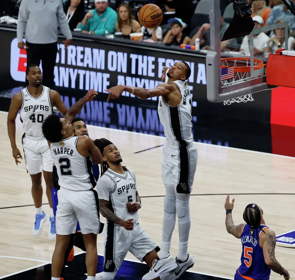 San Antonio Spurs center Victor Wembanyama (1) blocks a shot by New York Knicks guard Jose Alvarado (5) during the second quarter of Game 2 of the NBA Championship at Frost Bank Center in San Antonio on Friday, June 5, 2026.