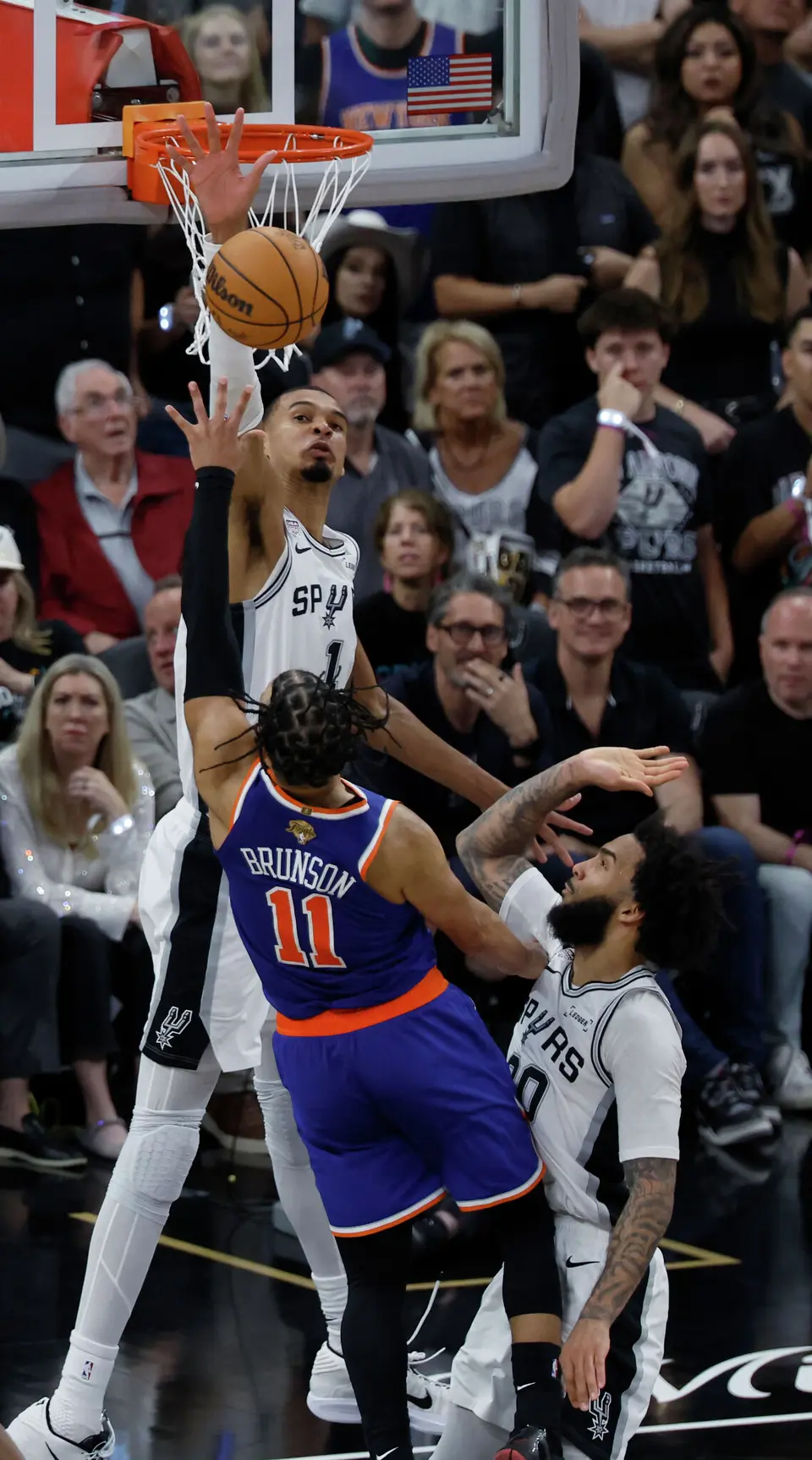 San Antonio Spurs center Victor Wembanyama (1) tries to block the shot of New York Knicks guard Jalen Brunson (11) during the fourth quarter of Game 2 of the NBA Championship at Frost Bank Center in San Antonio on Friday, June 5, 2026. The Knicks beat the Spurs 105 to 104 to take a 2-0 lead.