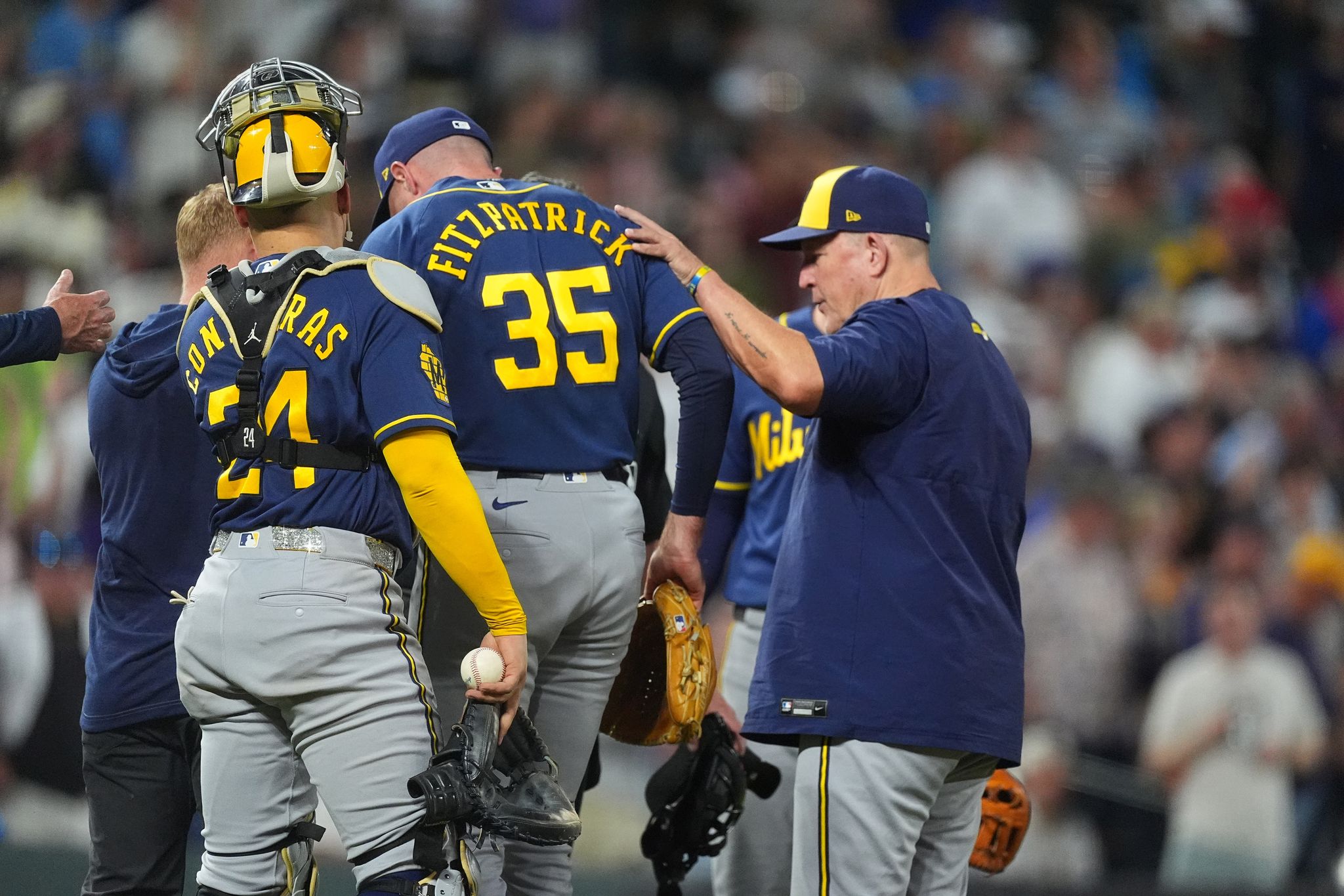 Image for Brewers' Brian Fitzpatrick gets injured on warmup pitch in first appearance after promotion