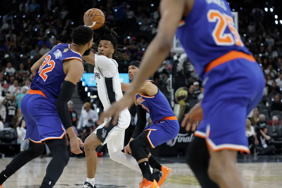 San Antonio Spurs guard Stephon Castle (5) tries to find a way past the Knicks defense during the third quarter of Game 2 of the NBA Championship at Frost Bank Center in San Antonio on Friday, June 5, 2026.