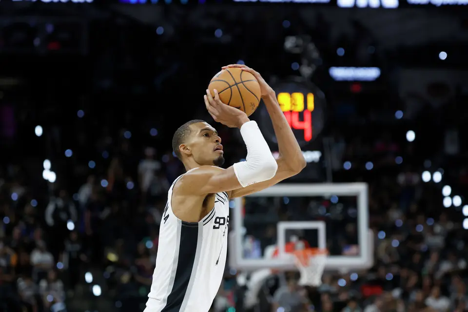 San Antonio Spurs center Victor Wembanyama (1) shoots a three point shot during the third quarter of Game 2 of the NBA Championship at Frost Bank Center in San Antonio on Friday, June 5, 2026.