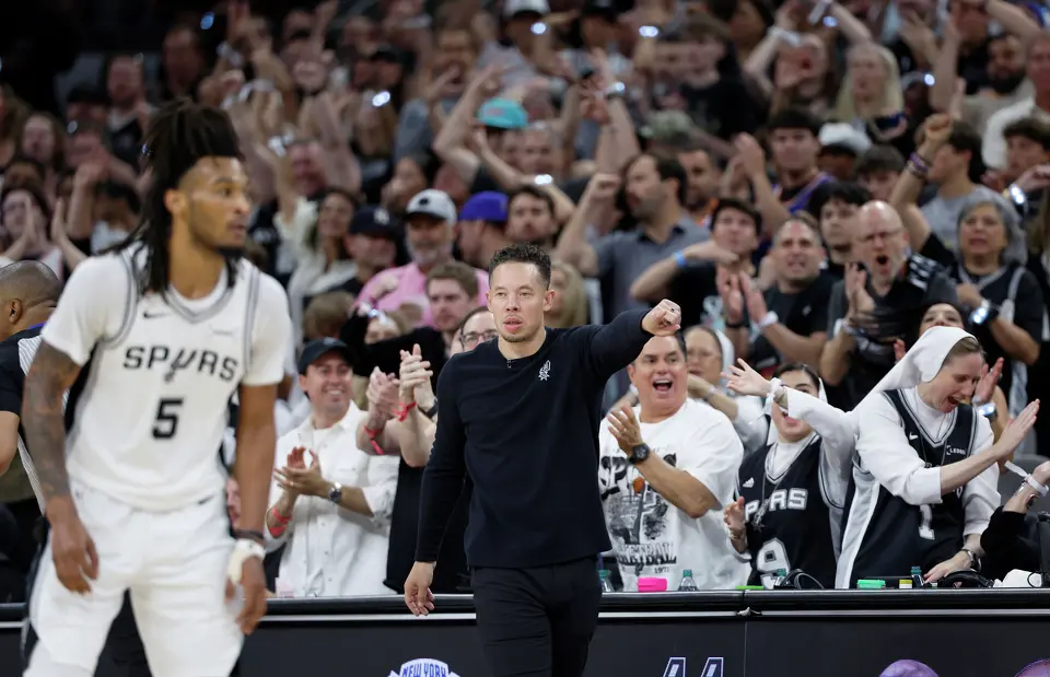 San Antonio Spurs head coach Mitch Johnson shouts directions to San Antonio Spurs guard Stephon Castle (5) during the third quarter of Game 2 of the NBA Championship at Frost Bank Center in San Antonio on Friday, June 5, 2026.