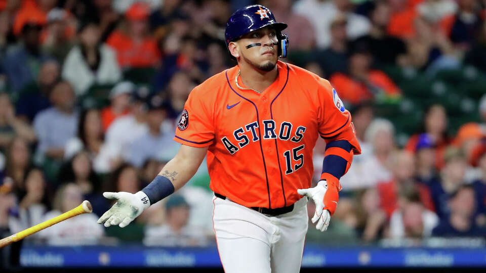 Houston Astros designated hitter Isaac Paredes flips his bat as he watches his hit against the Athletics during the third inning of a baseball game Friday, June 5, 2026, in Houston. 