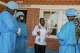 Richard Lokudu, center, the medical director of Mongbwalu General Hospital, speaks with UN peacekeepers in Mongbwalu, Congo, Friday, June 5, 2026.
