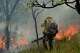 A Xerente Indigenous firefighter attends a controlled burn as part of a fire prevention operation along Brazil's environmental protection agency, IBAMA, at the Xerente territory, near Tocantinia, Tocantins state, Brazil, Tuesday, May 19, 2026.