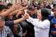 Presidential candidate Keiko Fujimori, of the Popular Force party, greets supporters before voting in the presidential runoff election in Lima, Peru, Sunday, June 7, 2026.