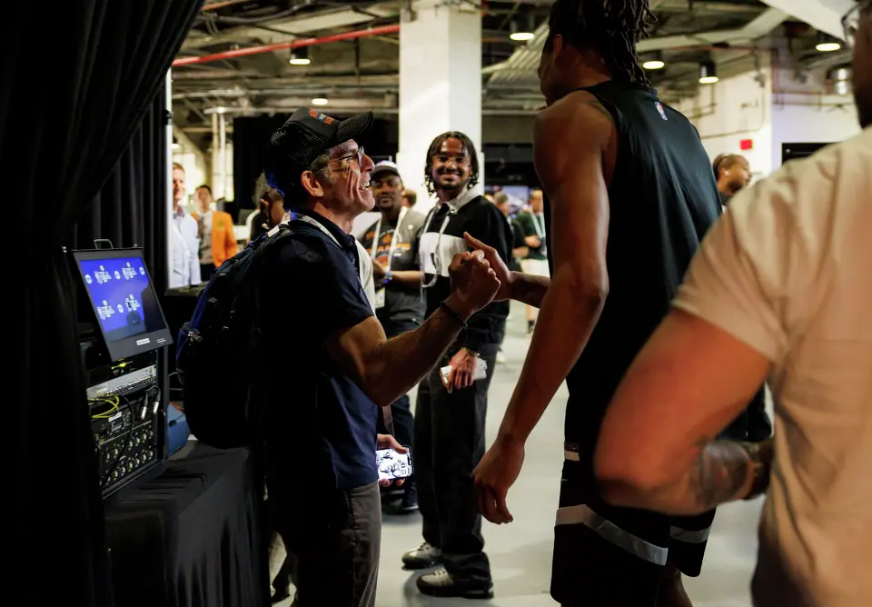 Ben Stiller, left, introduces himself to San Antonio Spurs guard Devin Vassell after a news conference at Madison Square Garden in New York, Sunday, June 7, 2026, ahead of Game 3 of the NBA Finals against the New York Knicks.