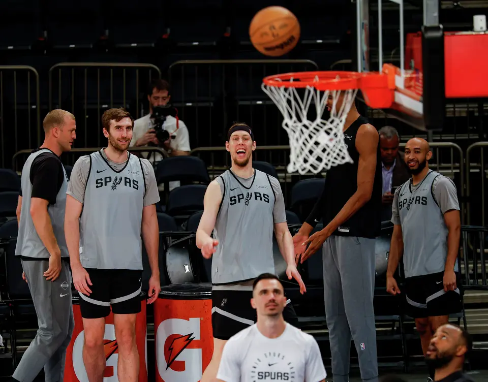 San Antonio Spurs forward Kelly Olynyk, center, reacts as he watches his shot during practice at Madison Square Garden in New York, Sunday, June 7, 2026, as the team prepares for Game 3 of the NBA Finals against the New York Knicks.