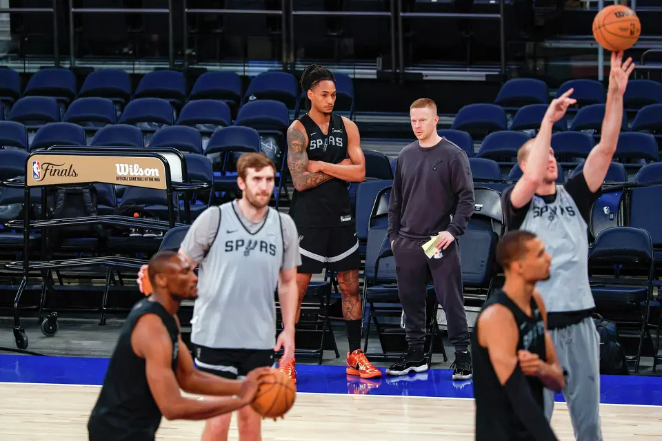 San Antonio Spurs guard Devin Vassell, center left, stands with San Antonio Spurs associate head coach Sean Sweeney during practice at Madison Square Garden in New York, Sunday, June 7, 2026, as the team prepares for Game 3 of the NBA Finals against the New York Knicks.
