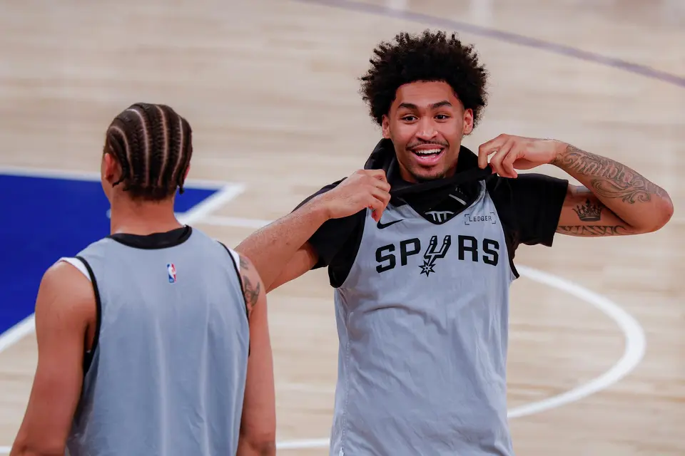 San Antonio Spurs forward Carter Bryant, left, and guard Dylan Harper joke around during practice at Madison Square Garden in New York, Sunday, June 7, 2026, as the team prepares for Game 3 of the NBA Finals against the New York Knicks.