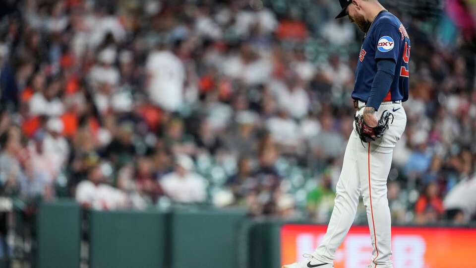 Houston Astros starting pitcher Mike Burrows kicks the dirt on the mound after Athletics designated hitter Brent Rooker hit a solo home run off him during the fifth inning of a Major League Baseball game at Daikin Park in Houston, Sunday, June 7, 2026.