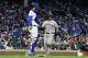 Giants first baseman Rafael Devers scores on a first-inning single by Giants outfielder Jung Hoo Lee on Sunday against the Cubs at Wrigley Field in Chicago.