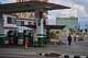 FILE - A man walks past a gas station that has run out of fuel, located near the U.S Embassy, pictured in the background, in Havana, Cuba, Feb. 7, 2026.