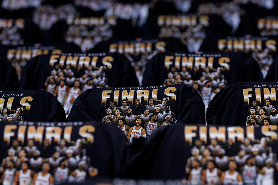 T-shirts are laid out on seats for fans ahead of Game 3 of the NBA Finals between the San Antonio Spurs and the New York Knicks at Madison Square Garden in New York, Monday, June 8, 2026.