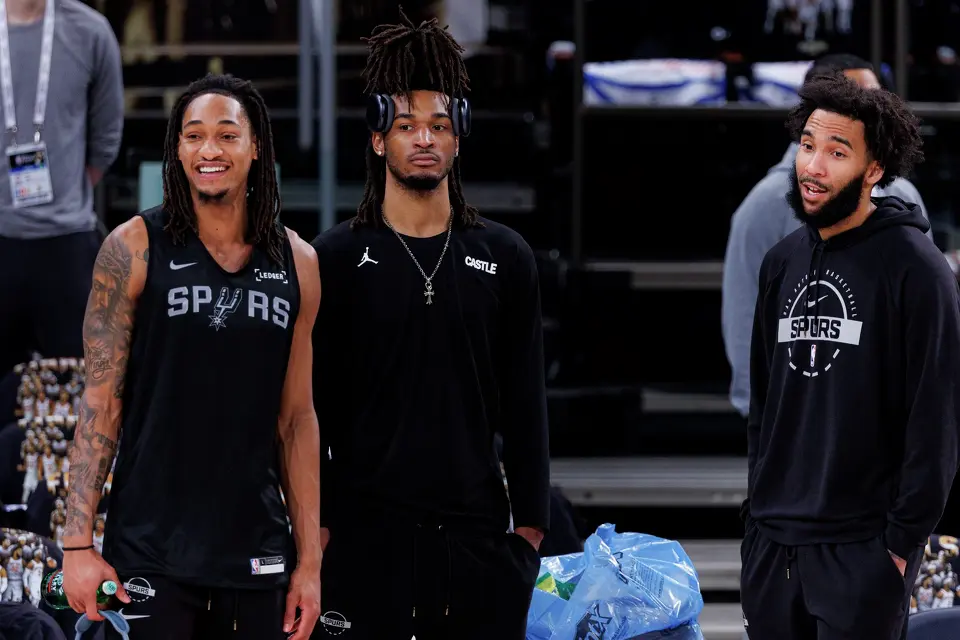 San Antonio Spurs players Devin Vassell, from left, Stephon Castle and Julian Champagnie watch their teammates during participate at Madison Square Garden in New York, Monday, June 8, 2026, ahead of Game 3 of the NBA Finals against the New York Knicks.