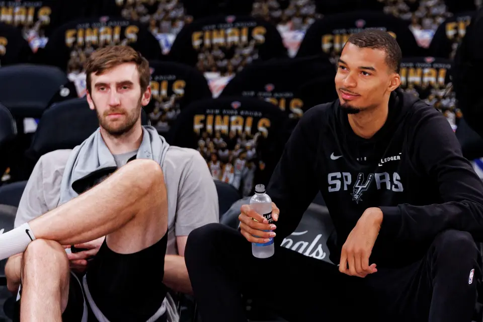 San Antonio Spurs center Luke Kornet, left, and center Victor Wembanyama watch their teammates shootaround at Madison Square Garden in New York, Monday, June 8, 2026, ahead of Game 3 of the NBA Finals against the New York Knicks.