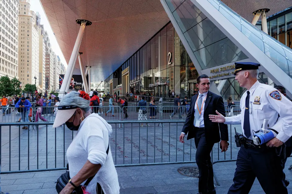 New York police officers walk the permitter of Madison Square Garden hours before Game 3 of the NBA Finals between the New York Knicks and the San Antonio Spurs on Monday, June 8, 2026, in New York. The NYPD and U.S. Secret Service established a large security perimeter, cancelling all public watch parties outside of the arena, after it was announced that President Donald Trump would attend the game.