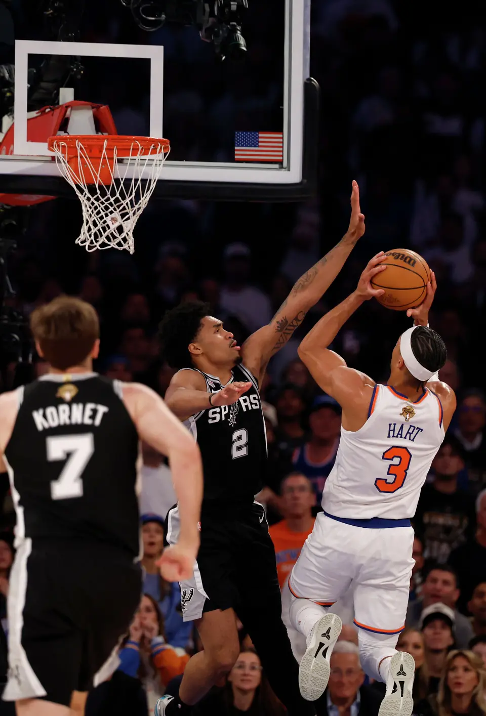 New York Knicks guard Josh Hart (3) takes a jump shot over San Antonio Spurs guard Dylan Harper (2) during the first half of game three of the NBA Championship at Madison Square Garden in New York City on Monday, June 8, 2026.