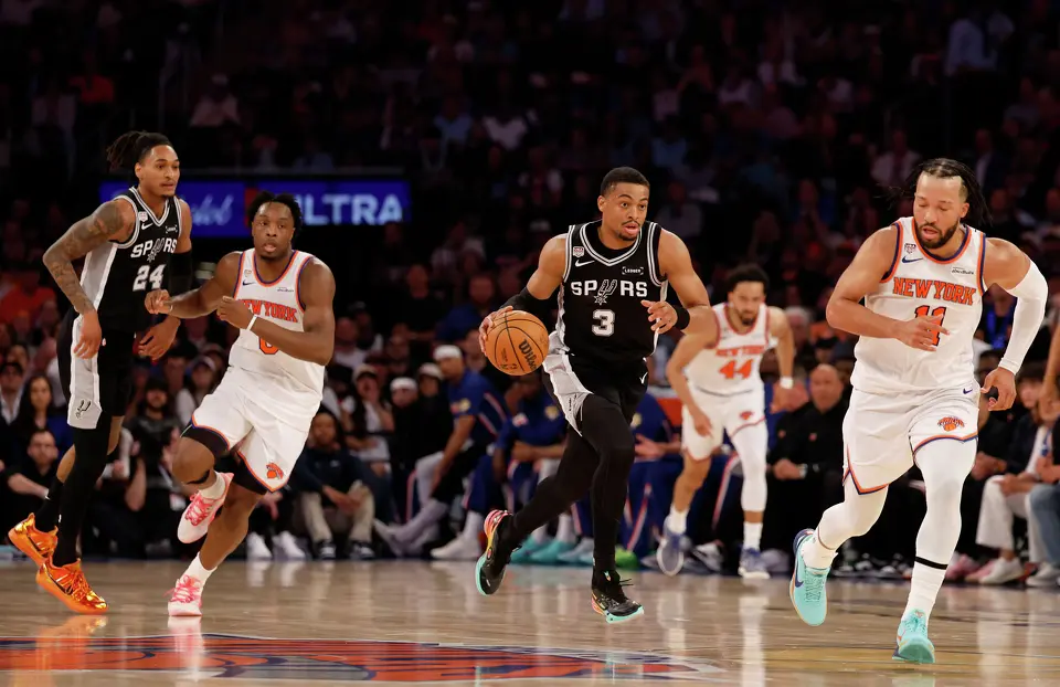 San Antonio Spurs forward Keldon Johnson (3) brings the ball up the court with New York Knicks guard Jalen Brunson (11) in tow during the first half of game three of the NBA Championship at Madison Square Garden in New York City on Monday, June 8, 2026.