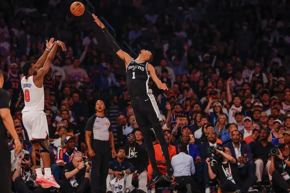 San Antonio Spurs center Victor Wembanyama (1) leaps to intercept the shot of New York Knicks forward Og Anunoby (8) during the first quarter of Game 3 of the NBA Finals at Madison Square Garden in New York, Monday, June 8, 2026.