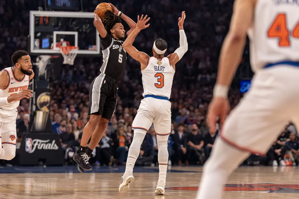 San Antonio Spurs guard Stephon Castle (5) looks for the pass over New York Knicks guard Josh Hart (3) during the first half of game three of the NBA Championship at Madison Square Garden in New York City on Monday, June 8, 2026.