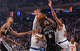 San Antonio Spurs guard Stephon Castle (5) makes a layup while being guarded by New York Knicks guard Josh Hart (3) and New York Knicks center Karl-Anthony Towns (32) during the first half of game three of the NBA Championship at Madison Square Garden in New York City on Monday, June 8, 2026.
