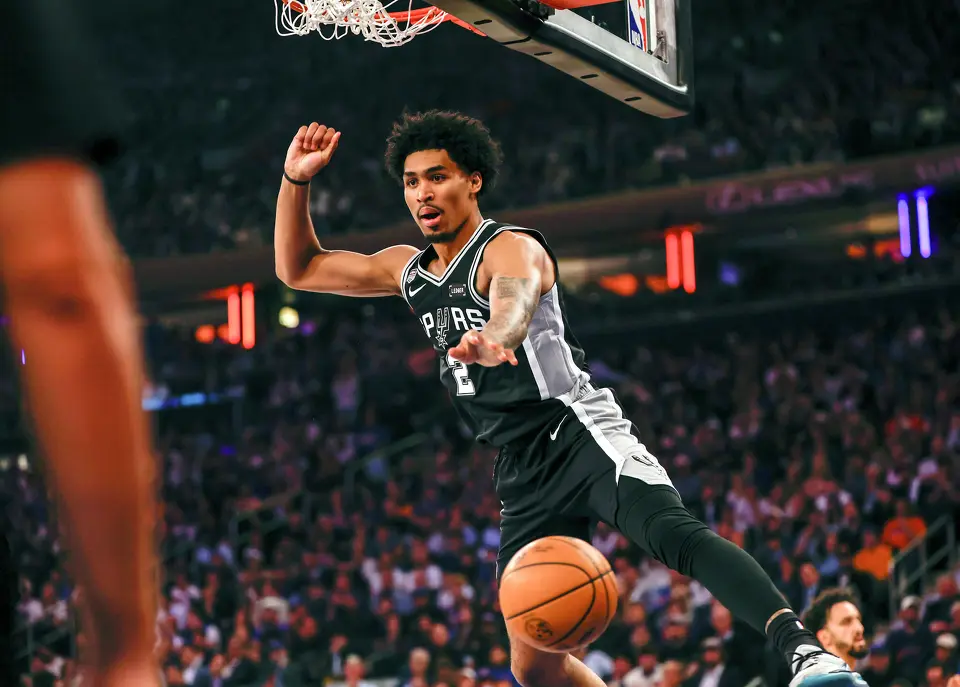 San Antonio Spurs guard Dylan Harper (2) gets a slam dunk during the first half of game three of the NBA Championship at Madison Square Garden in New York City on Monday, June 8, 2026.