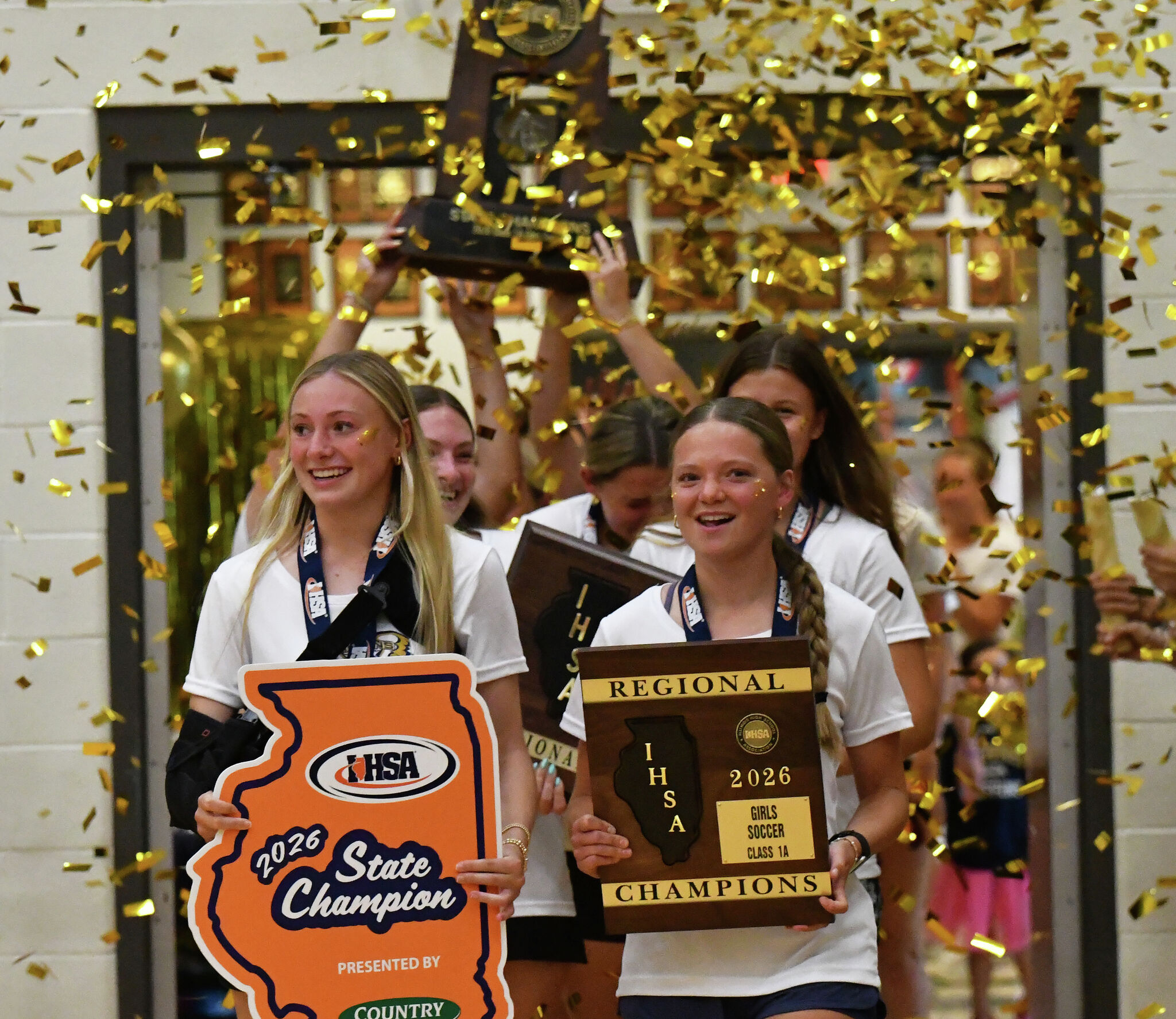 Father McGivney celebrates girls soccer team's first state championship