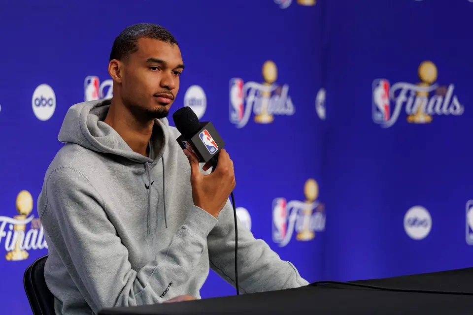 San Antonio Spurs center Victor Wembanyama listens to a question from a reporter during a news conference at Madison Square Garden in New York, Tuesday, June 9, 2026, following the Spurs’ 115-111 win in Game 3 of the NBA Finals against the New York Knicks.