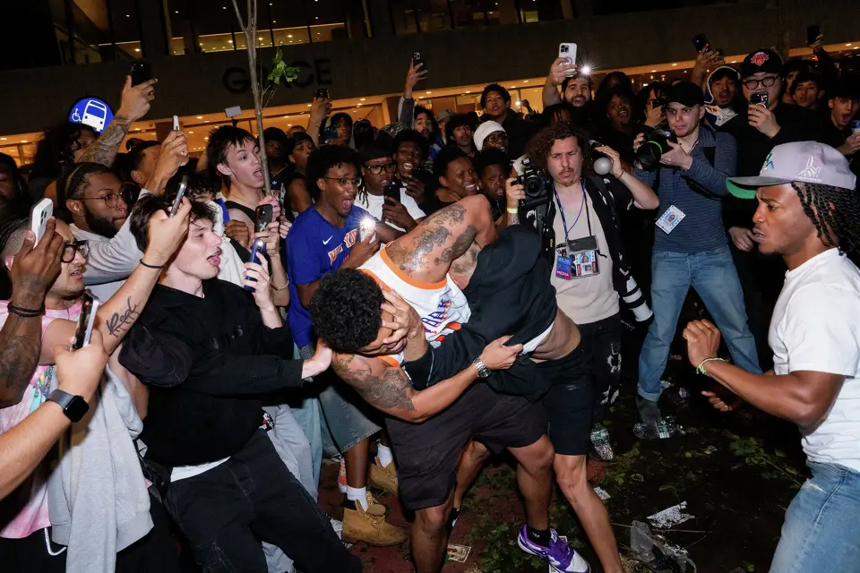Fans fight outside of a watch party at Bryant Park for Game 3 of the NBA Finals between New York Knicks and San Antonio Spurs on June 8, 2026 in New York City. The New York City Police Department and Secret Service cancelled an NBA Finals watch party near Madison Square Garden, with fans advised to arrive at least two hours before Monday's game due to heightened security for U.S. President Donald Trump's attendance.