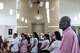 Rodney Brown attends a funeral mass in Dallas, Tuesday, June 9, 2026, at St. Cecilia Catholic Church for Marisol Pérez and Erik Pérez Jr. who died in a late May apartment fire. Brown is credited for saving Marisol’s 10-year-old daughter Vanessa from the fire.