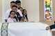 Erik and daughter Vanessa Pérez watch as the casket of Marisol and Erik Jr. Pérez who died in a late May apartment fire is wheeled past out of St. Cecilia Catholic Parish Dallas, Tuesday, June 9, 2026.