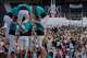 Performers make a human tower, known as Castells, for Pope Leo XIV as he leads a vigil of prayer at the Lluis Companys Olympic Stadium, in Barcelona, Tuesday, June 9, 2026.