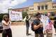 Supporters of Austin Metcalf hold signs before a verdict is announced in Karmelo Anthony’s murder trial outside of the Collin County Courthouse in McKinney, TX, Tuesday, June 9, 2026. The Collin County jury found Karmelo Anthony guilty of murder in the fatal stabbing of 17-year-old Metcalf last April at a Frisco track meet at David Kuykendall Stadium.