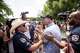 Supporters of Austin Metcalf and Karmelo Anthony clash after a Collin County jury found Karmelo Anthony guilty of murder outside of the Collin County Courthouse in McKinney, TX, Tuesday, June 9, 2026. Anthony is accused of killing 17-year-old Austin Metcalf last April at a Frisco track meet at David Kuykendall Stadium.