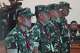 Indonesian service members, from left, Edi Sudarko, Budhi Hariyanto Widhi Cahyono, Nandala Dwi Prasetya and Sami Lakka who are accused of carrying an acid attack to human right activist Andrie Yunus, stand in attention during their sentencing hearing at a military court in Jakarta, Indonesia, Wednesday, June 10, 2026.