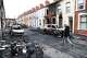 A man walks down a street after rioting broke out late Tuesday, in east Belfast, Northern Ireland, Wednesday, June 10, 2026, following a stabbing incident.