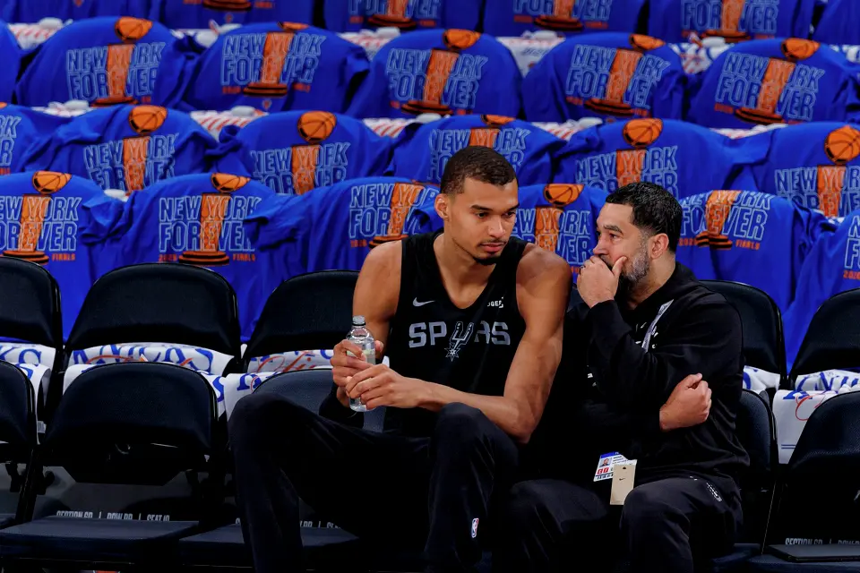 San Antonio Spurs center Victor Wembanyama talks with Spurs general manager Brian Wright during practice at Madison Square Garden in New York, Wednesday, June 10, 2026, ahead of Game 4 of the NBA Finals against the New York Knicks.