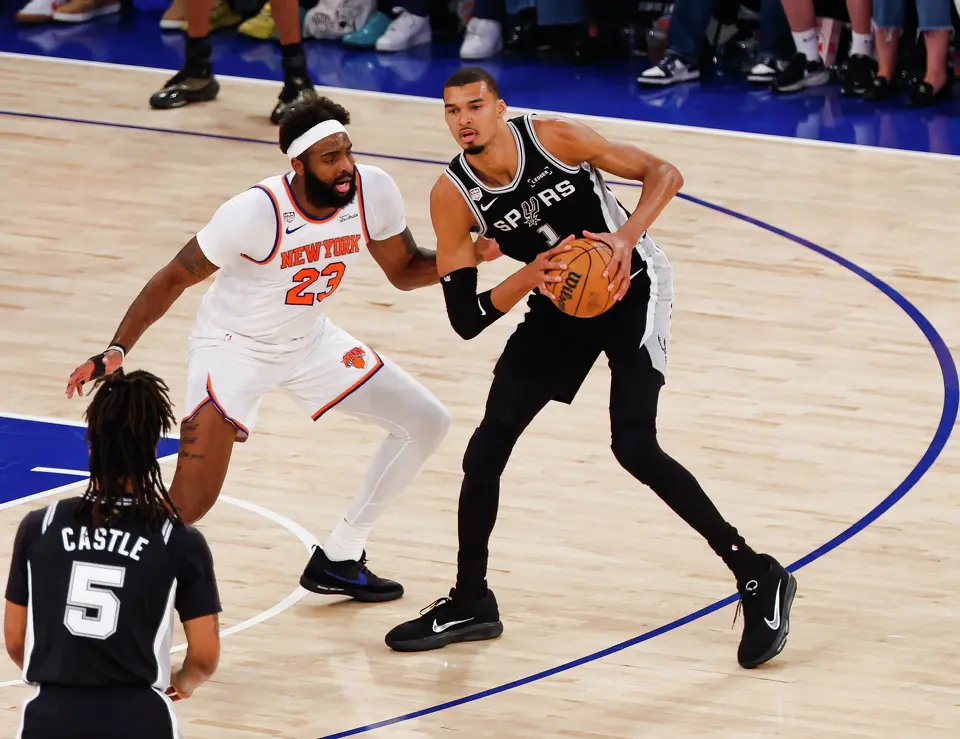 San Antonio Spurs center Victor Wembanyama (1) looks to make a pass during the first quarter of Game 4 of the NBA Finals at Madison Square Garden in New York, Wednesday, June 10, 2026.