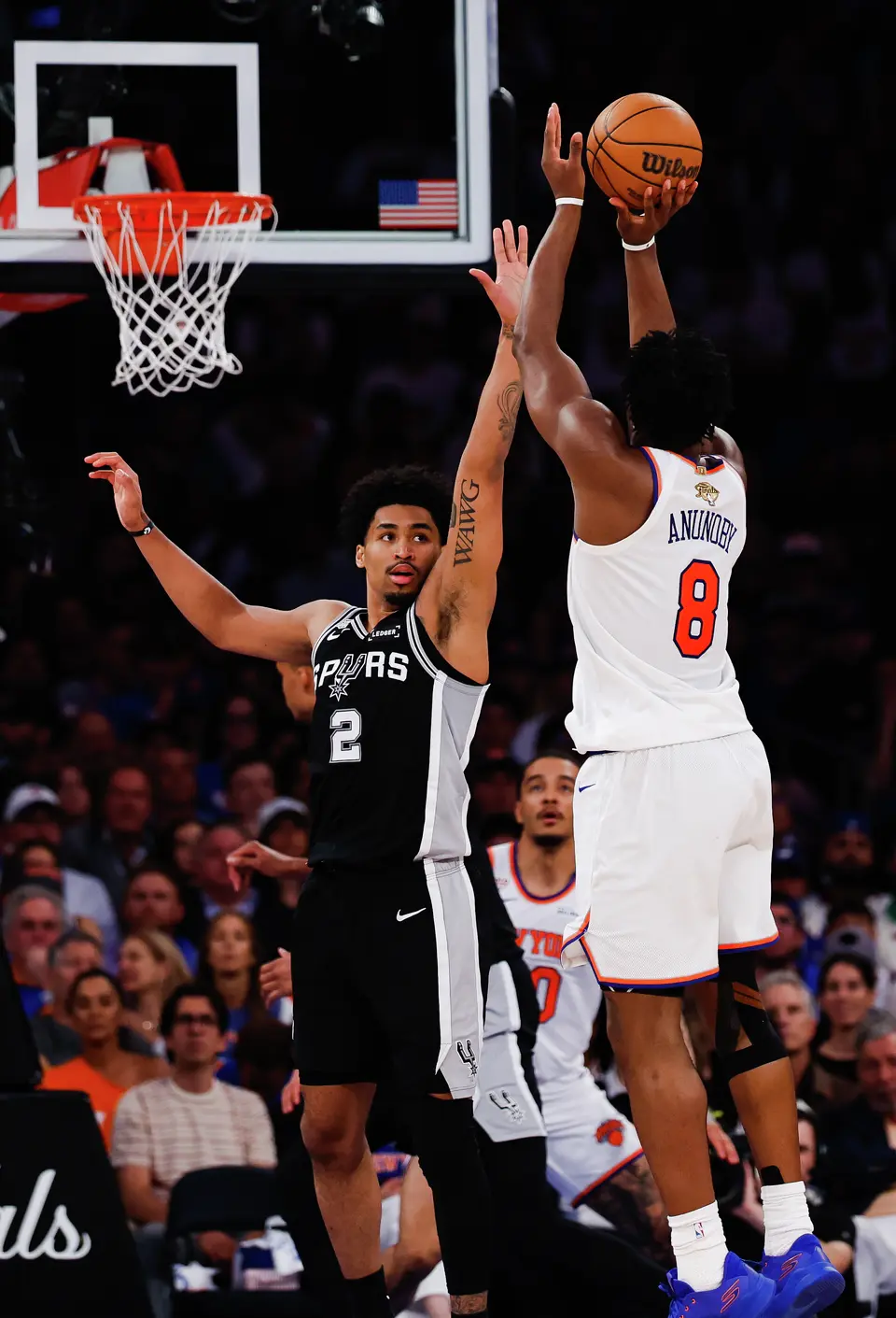 San Antonio Spurs guard Dylan Harper (2) jumps up to try to block a shot by New York Knicks forward Og Anunoby (8) during the second quarter of Game 4 of the NBA Finals at Madison Square Garden in New York, Wednesday, June 10, 2026.