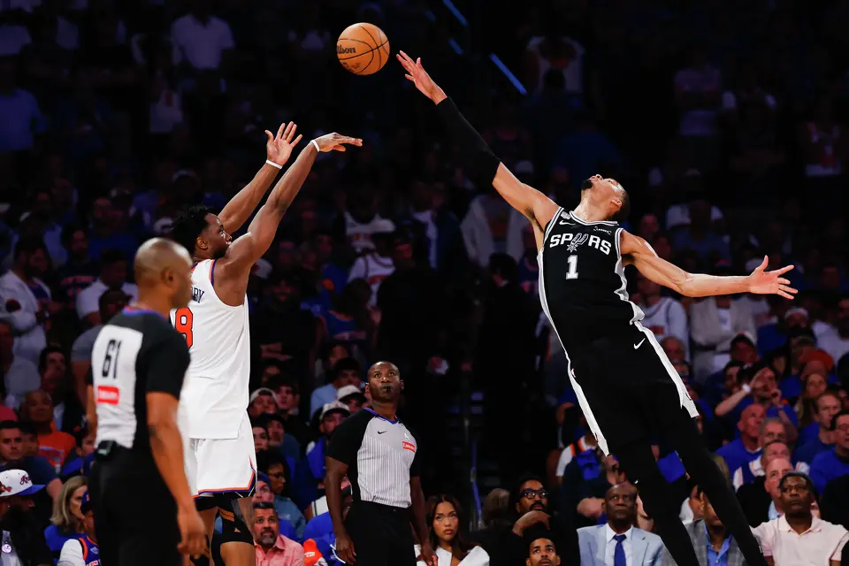 San Antonio Spurs center Victor Wembanyama (1) reaches to block a shot by New York Knicks forward Og Anunoby (8) during the second quarter of Game 4 of the NBA Finals at Madison Square Garden in New York, Wednesday, June 10, 2026.