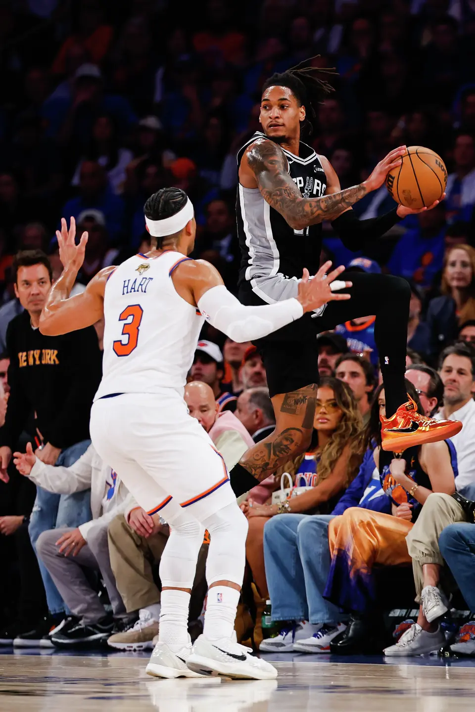 San Antonio Spurs guard Devin Vassell (24) jumps up to pass the ball during the second quarter of Game 4 of the NBA Finals at Madison Square Garden in New York, Wednesday, June 10, 2026.