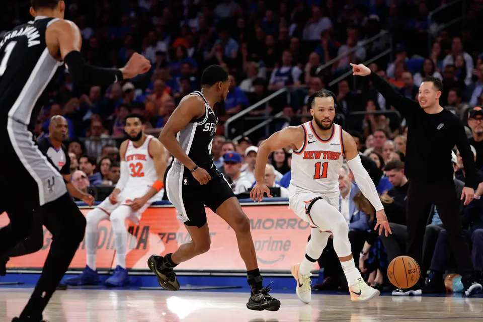 New York Knicks guard Jalen Brunson (11) dribbles down the court during the fourth quarter of Game 4 of the NBA Finals at Madison Square Garden in New York, Wednesday, June 10, 2026. The Knick defeated the Spurs 107-106, leading the series 3-1.