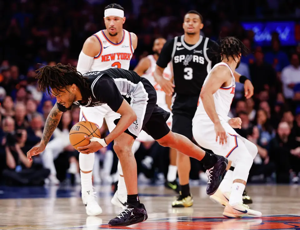 San Antonio Spurs guard Stephon Castle (5) tries to maintain control of the ball during the fourth quarter of Game 4 of the NBA Finals at Madison Square Garden in New York, Wednesday, June 10, 2026. The Knick defeated the Spurs 107-106, leading the series 3-1.