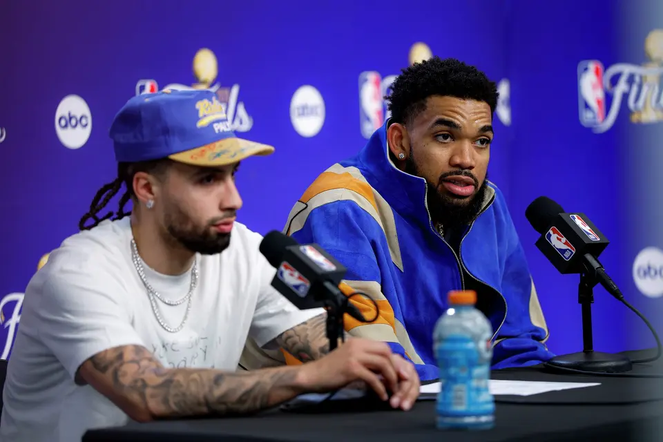 New York Knicks center Karl-Anthony Towns, right, and guard Jose Alvarado answer questions after Game 4 of the NBA Finals at Madison Square Garden in New York, Wednesday, June 10, 2026. The Knick chipped away at a 29-point deficit to defeat the Spurs 107-106, leading the series 3-1.