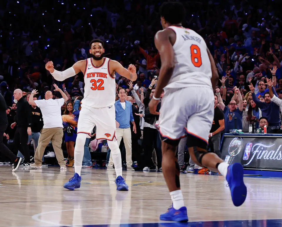 New York Knicks center Karl-Anthony Towns (32) reacts to a play during the fourth quarter of Game 4 of the NBA Finals at Madison Square Garden in New York, Wednesday, June 10, 2026. The Knicks defeated the Spurs 107-106, leading the series 3-1.