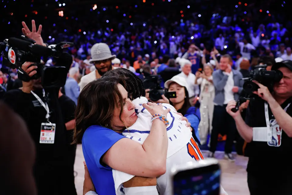 Mariska Hargitay hugs New York Knicks guard Jalen Brunson (11) after their win over the Spurs after Game 4 of the NBA Finals at Madison Square Garden in New York, Wednesday, June 10, 2026. The Knick defeated the Spurs 107-106, leading the series 3-1.